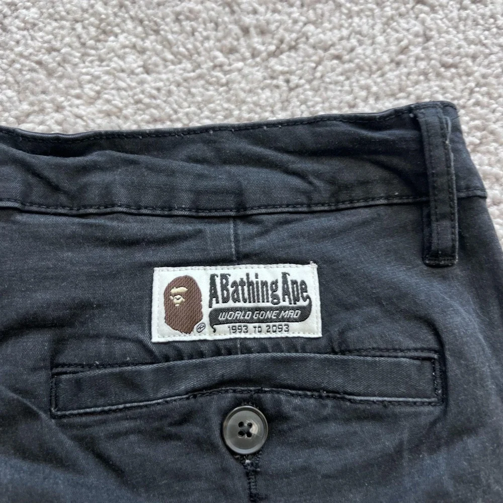 A Bathing Ape Chino Pants Mens M 30x25 Black Pleated Tapered Fit Stretch Logo